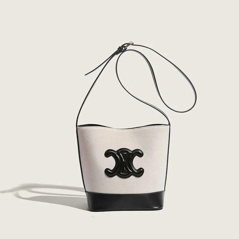 Chanel White Canvas Bucket Bag with Black CC Logo