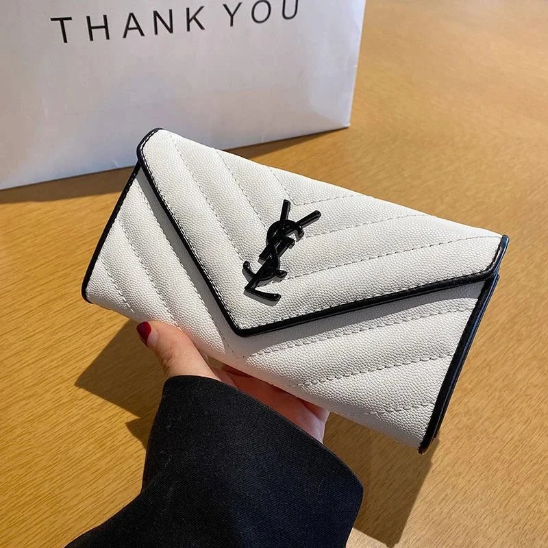 White YSL Quilted Clutch Bag with Black Logo