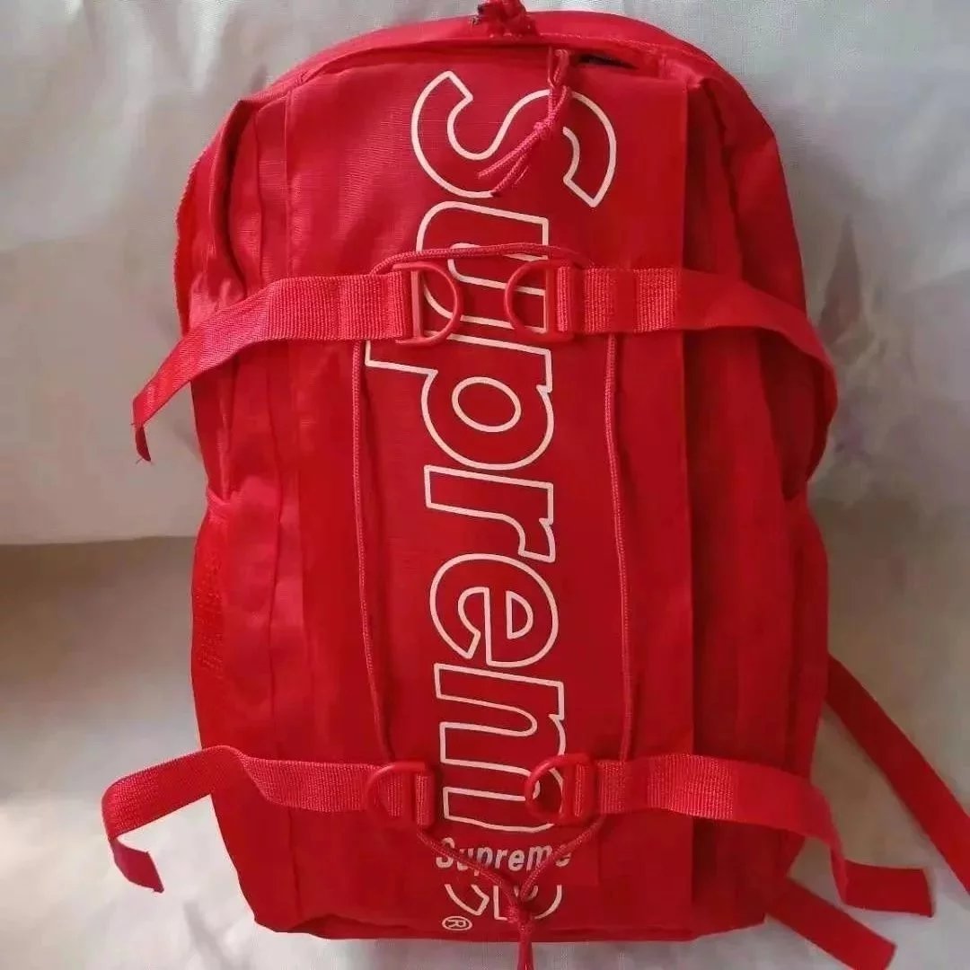 Supreme Red Backpack with Vertical Logo Design