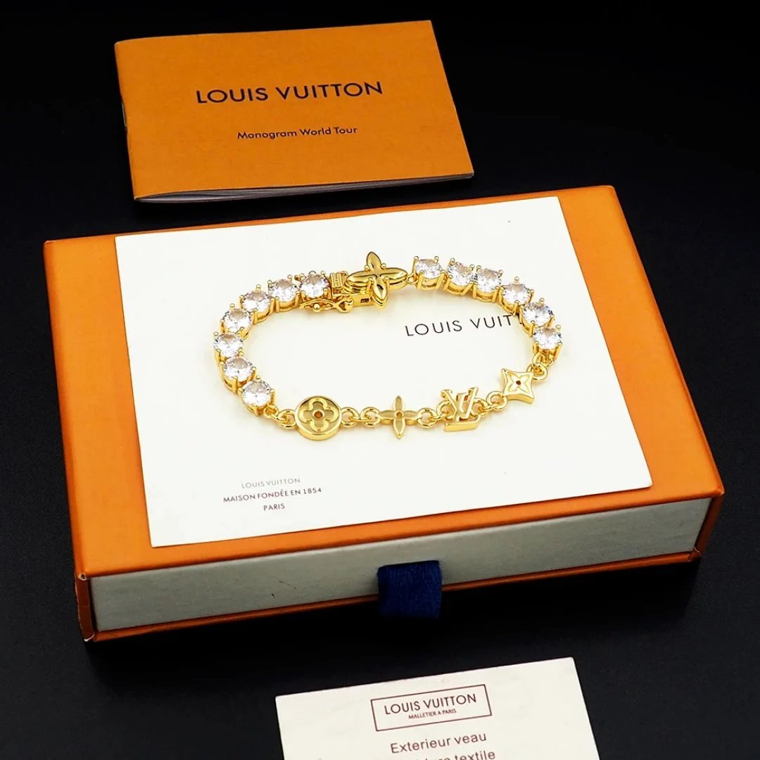 Louis Vuitton Gold Bracelet with Crystal Stones and Monogram Design