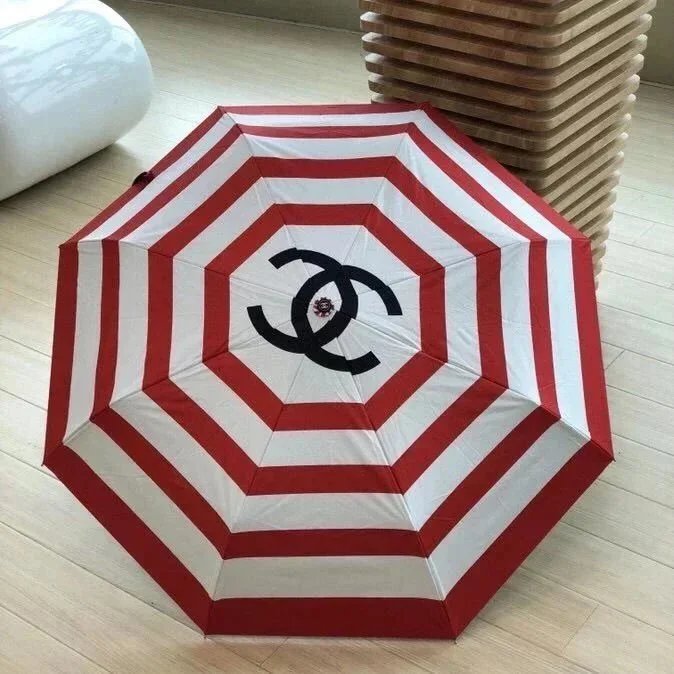 Chanel Red and White Striped Beach Umbrella with Logo