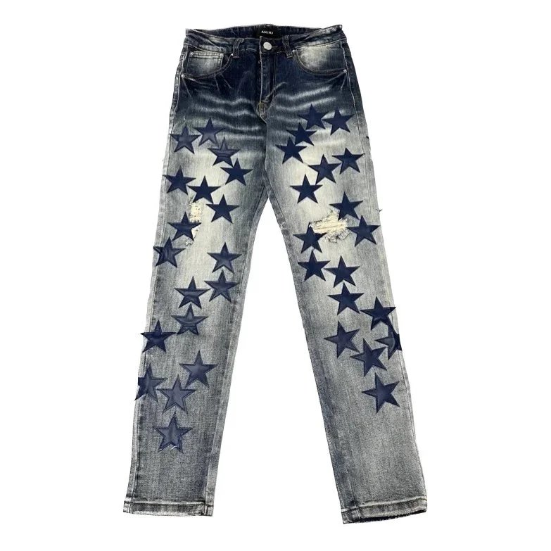 AMIRI Star Patched Distressed Denim Jeans