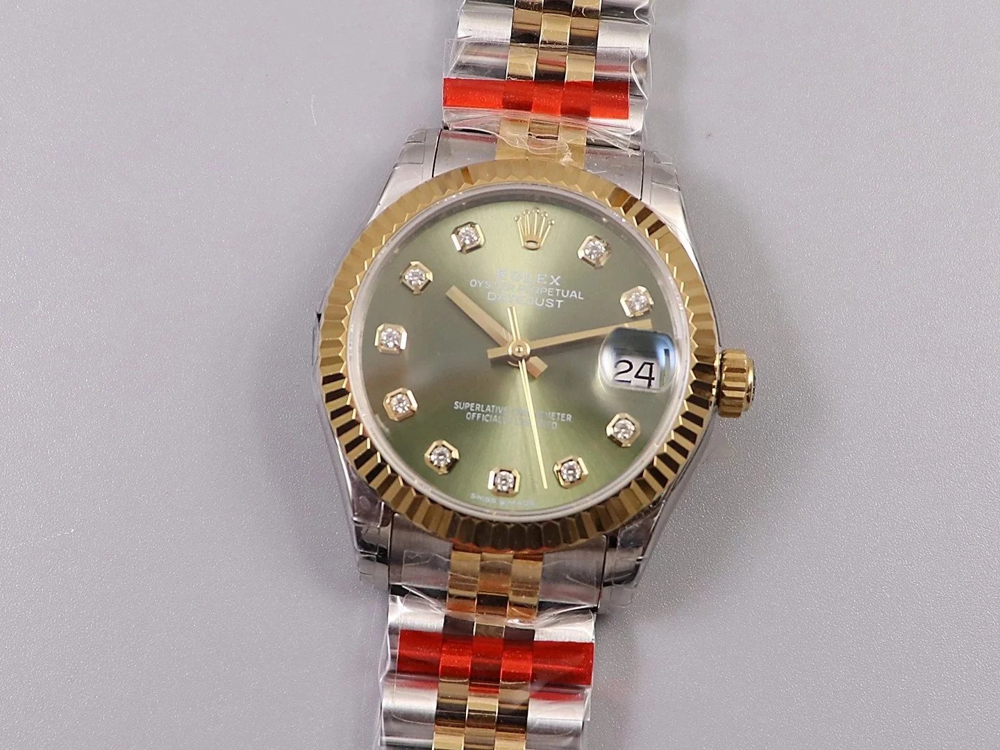 Rolex Datejust Two-Tone Watch with Green Dial and Diamond Hour Markers