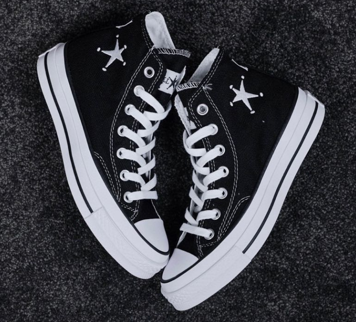 Black High Top Sneakers with White Stars and Laces