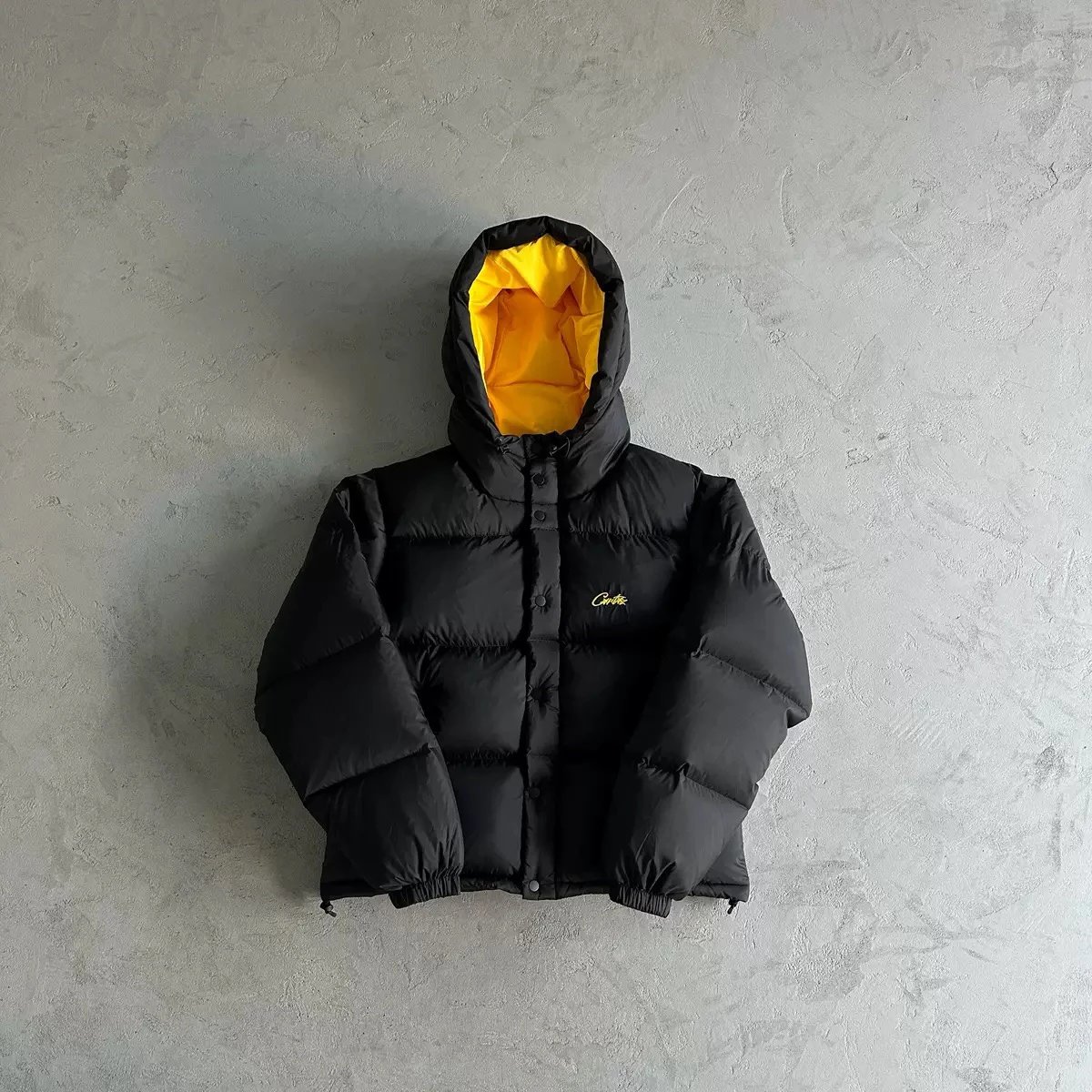 Crotic Black Puffer Jacket with Yellow Lining Hooded Winter Coat