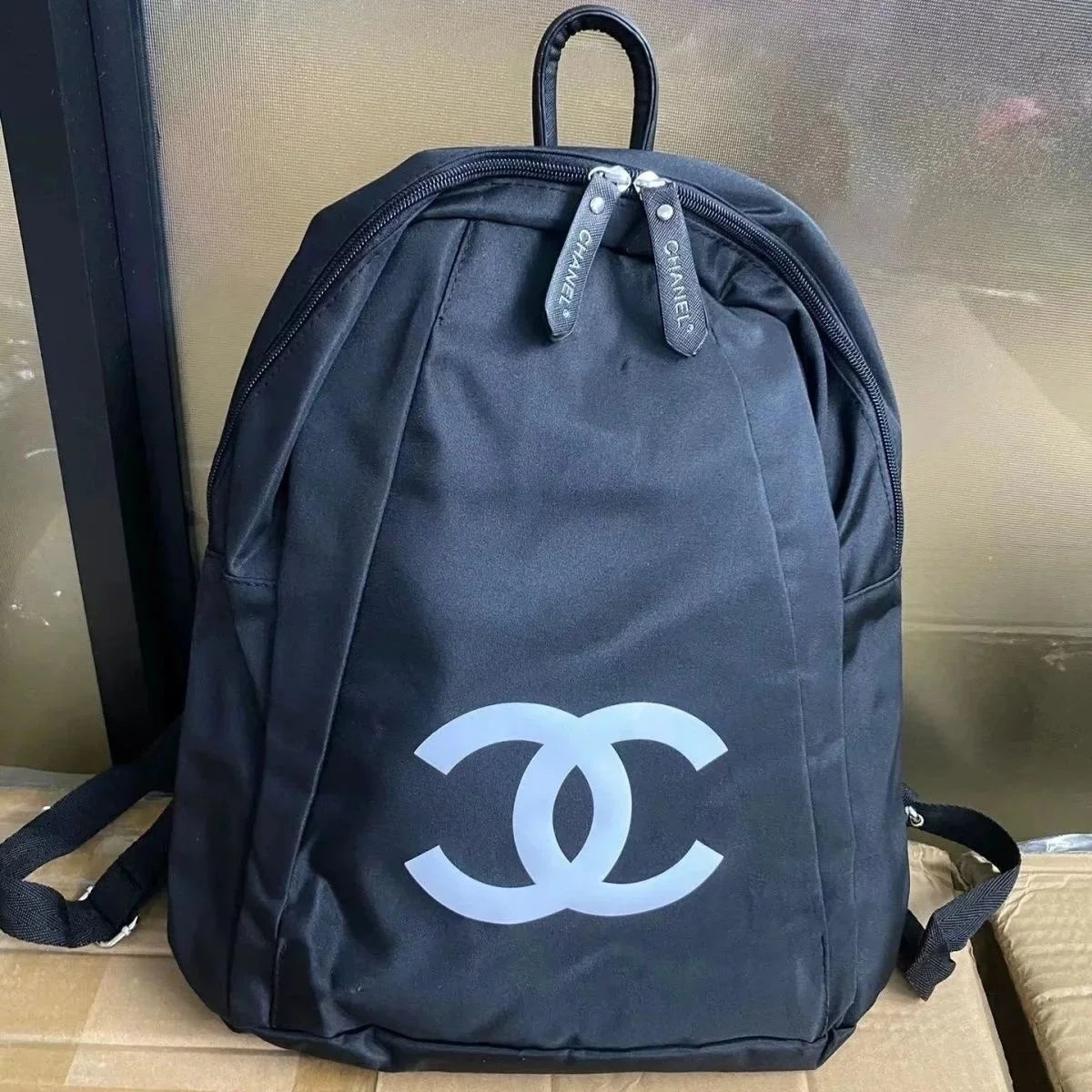 Chanel Black Logo Backpack for Women and Men