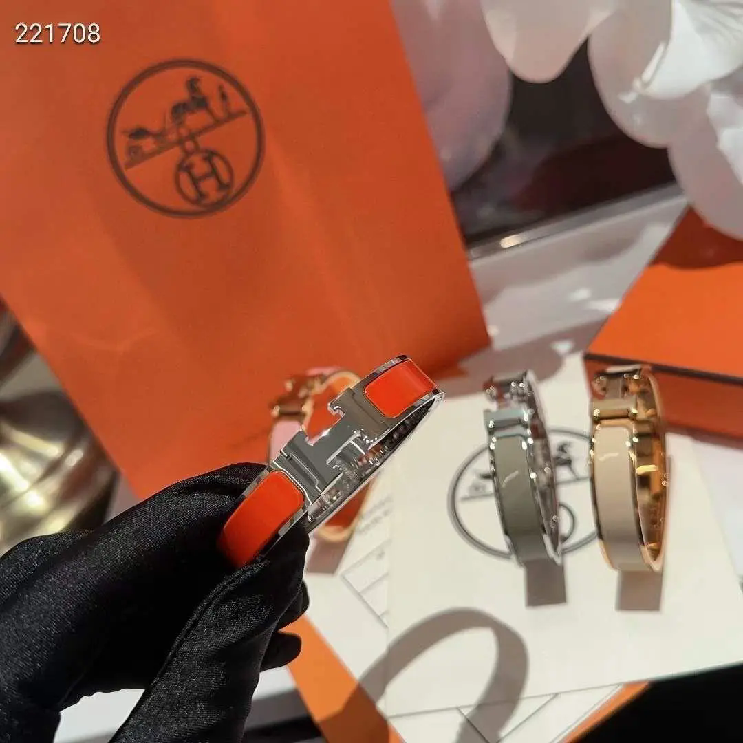 Hermès Clic H Bracelet in Orange Enamel and Silver